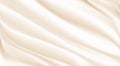 The luxury of beige or cream fabric texture background.Closeup of rippled gold silk fabric.